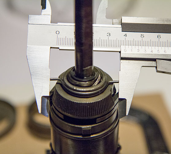 Measuring modified friction spring reach