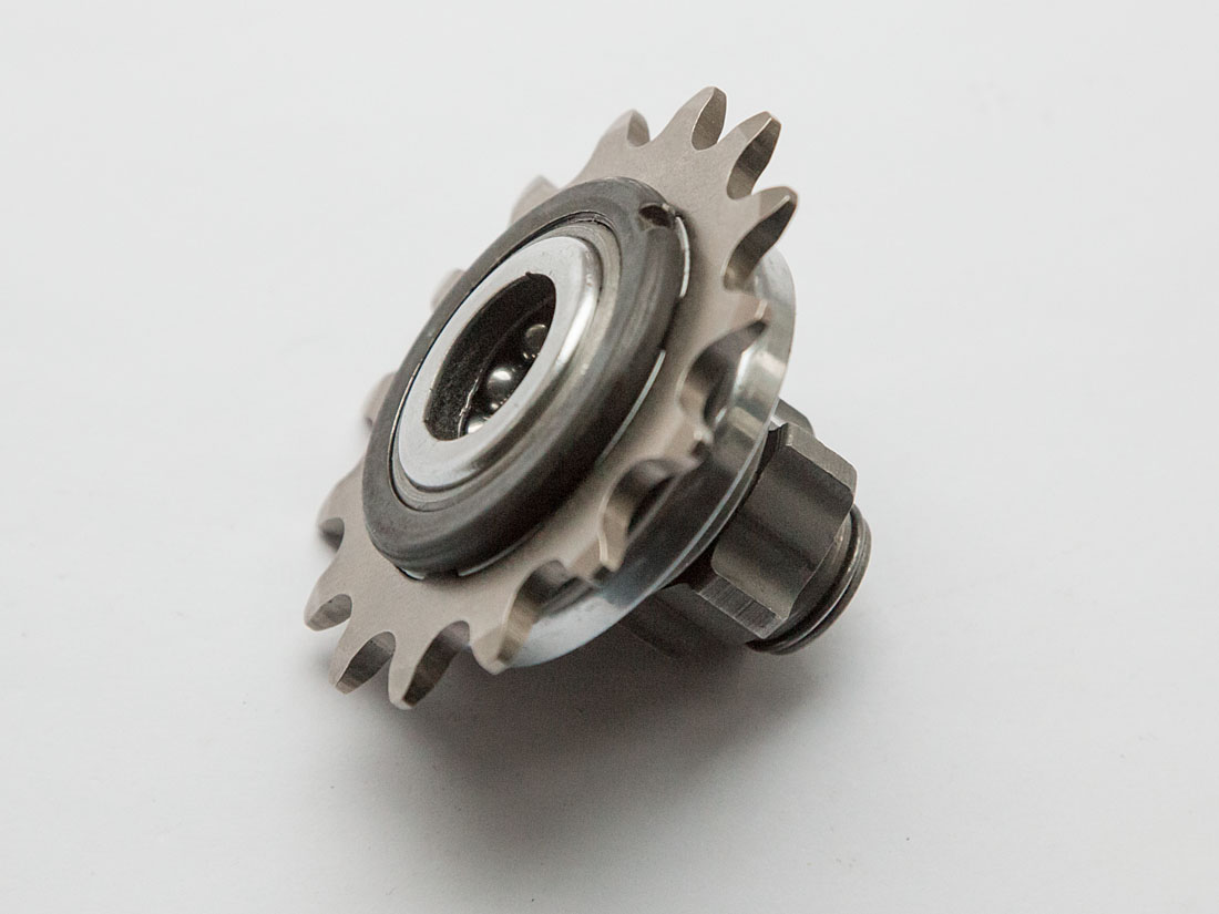 Sprocket and carrier mounted on threaded driver